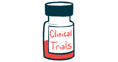 A medicine bottle, half full of liquid, is labeled clinical trials.